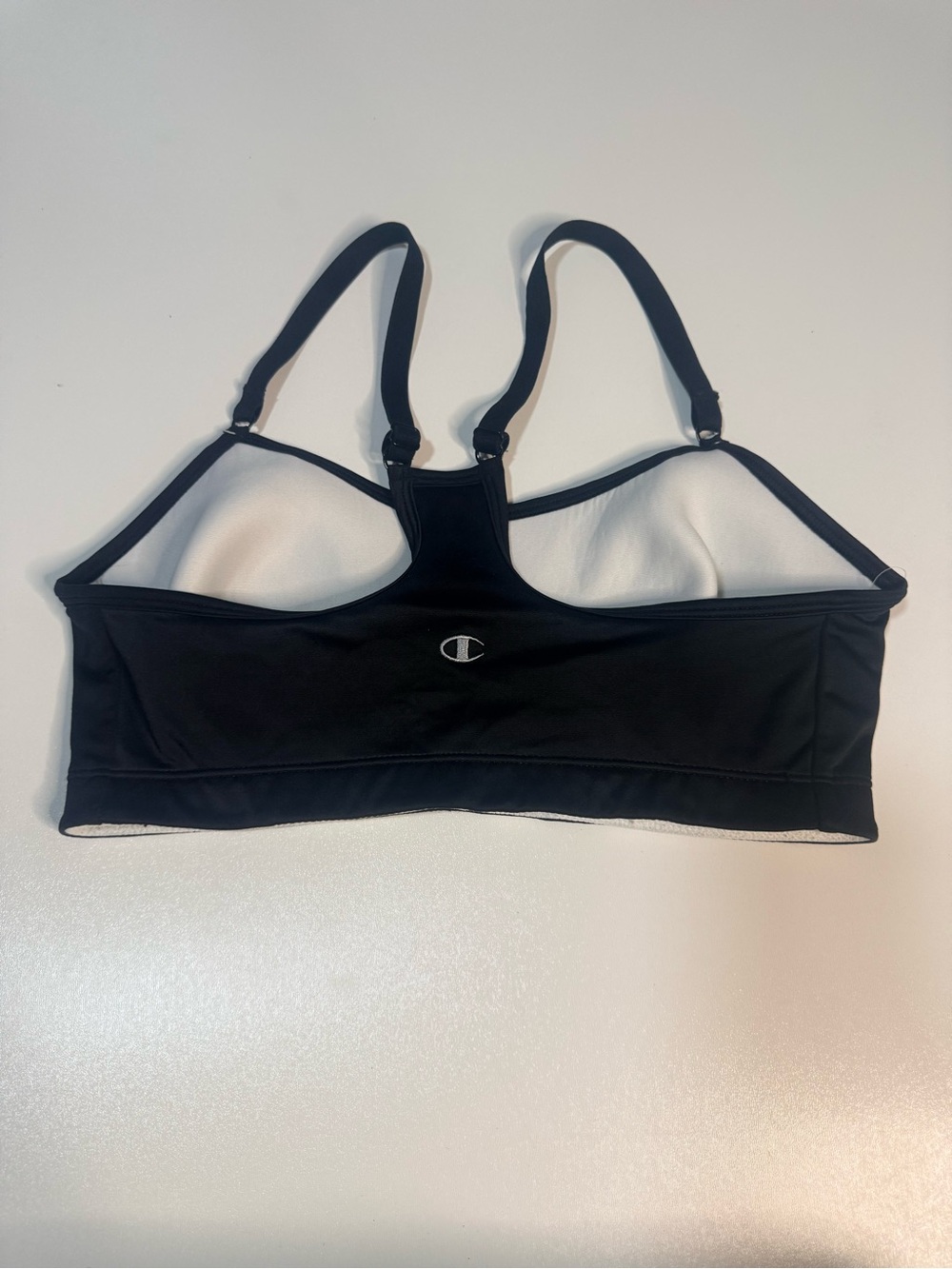 Champion Black Racerback Sports Bra with White Lining and Center 'C' Logo